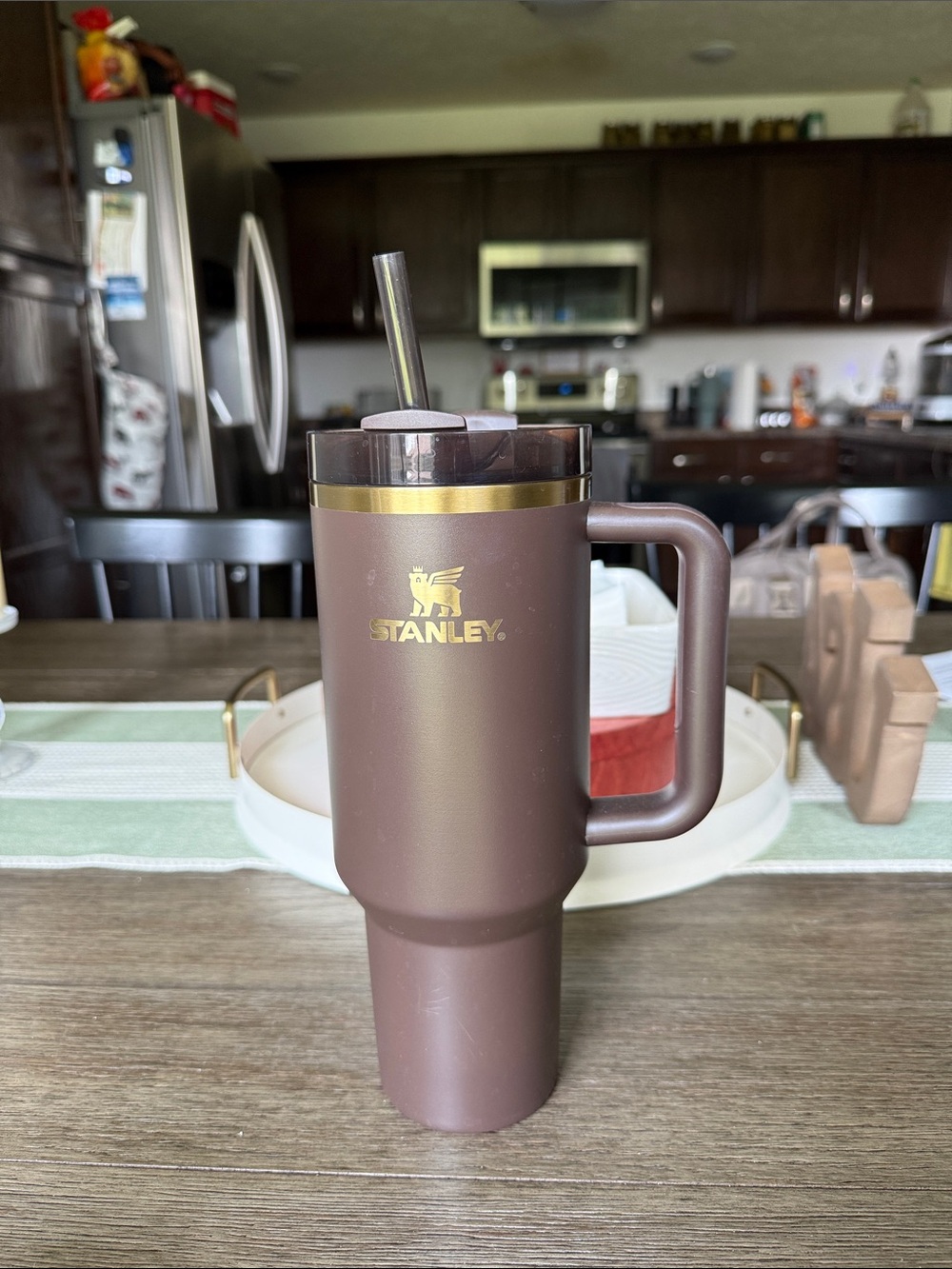 Limited Edition Stanley Brown Travel Tumbler with Gold Accent and Handle